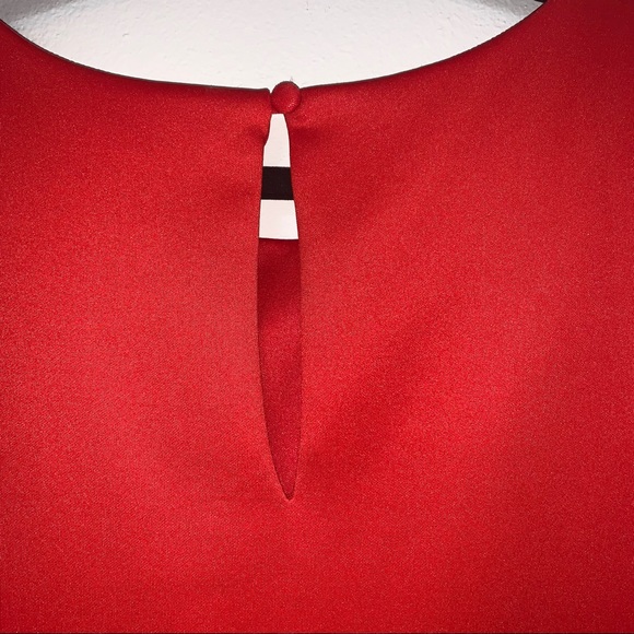 Bisou Bisou Peplum Top - Picture 9 of 9